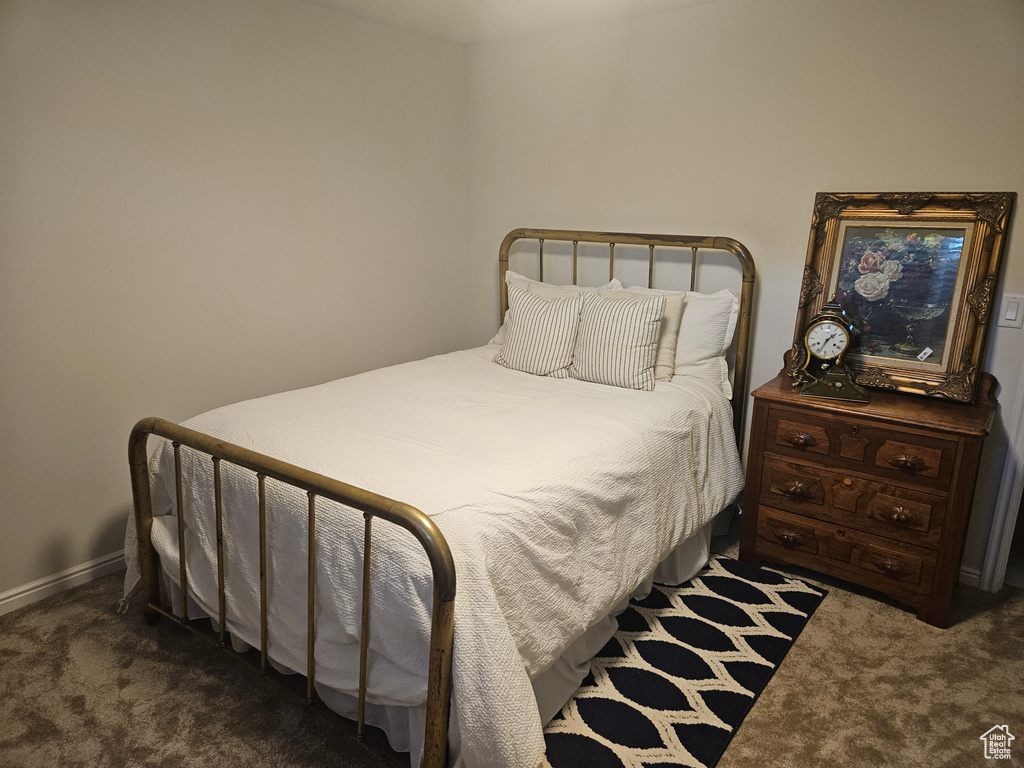 Bedroom featuring carpet flooring