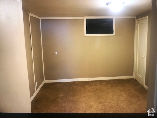 Finished below grade area with carpet floors and baseboards