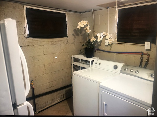 Laundry area featuring independent washer and dryer