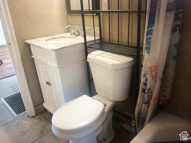 Full bath with vanity and toilet