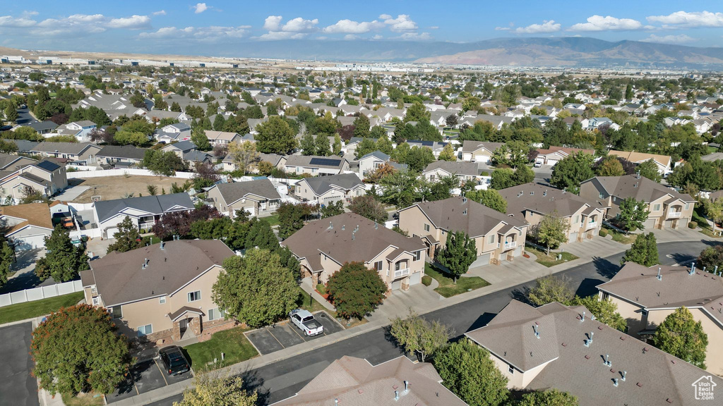 View of property location featuring nearby suburban area and a mountainous background