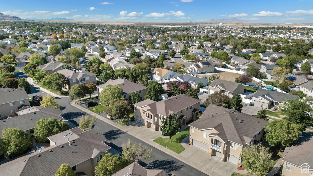 Aerial view of residential area with a mountain backdrop