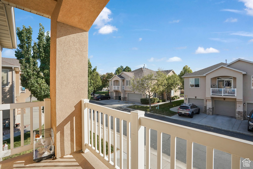 Balcony featuring a residential view