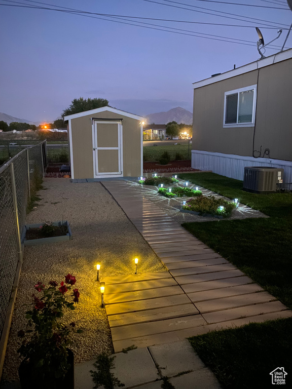 Fenced backyard with cooling unit