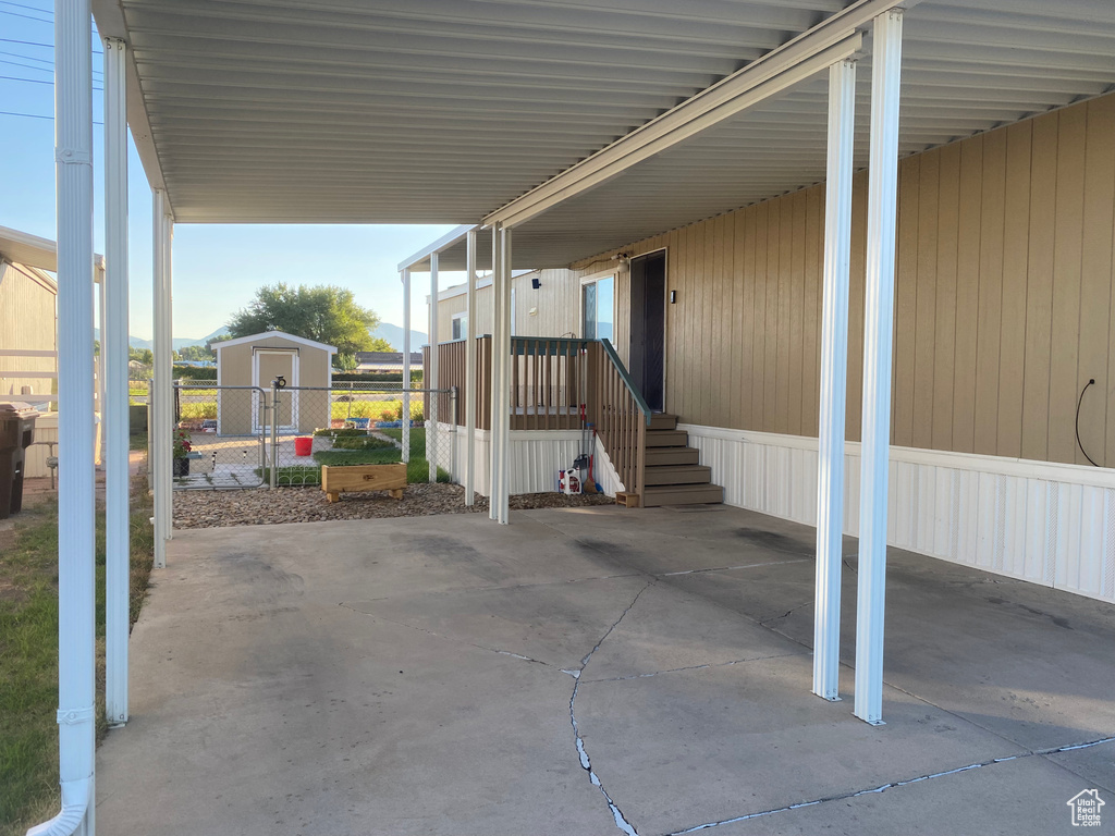 View of patio / terrace with an attached carport