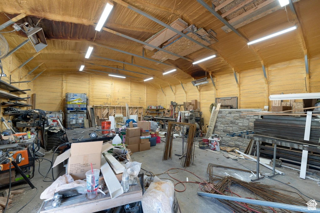 Garage featuring a workshop area