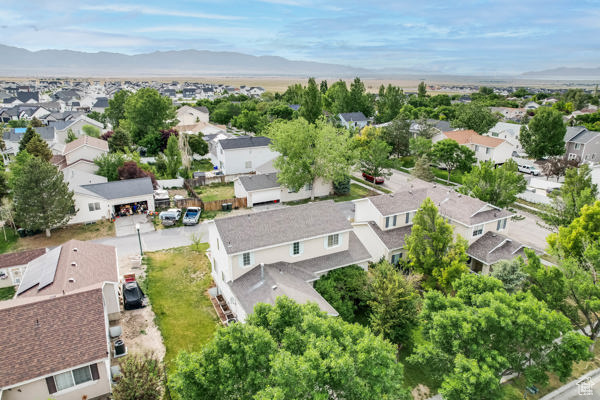 Aerial view of residential area with a mountain backdrop