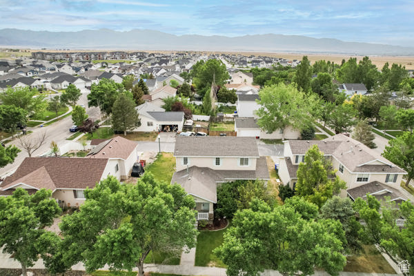 Aerial perspective of suburban area featuring mountains