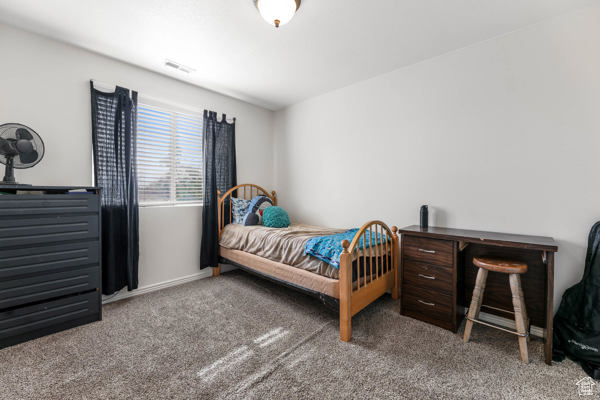 Bedroom featuring carpet