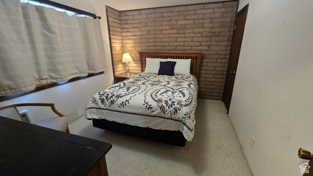 Bedroom featuring carpet