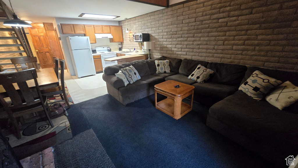 Living room with brick wall
