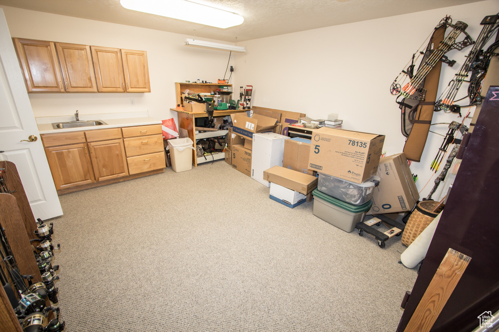 Storage room featuring a sink