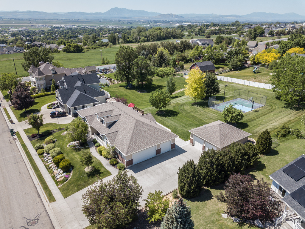 Aerial view of residential area with a mountain backdrop