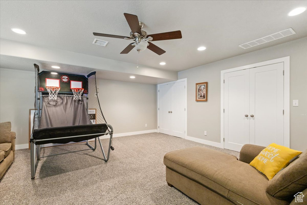 Playroom featuring ceiling fan, recessed lighting, carpet floors, and baseboards