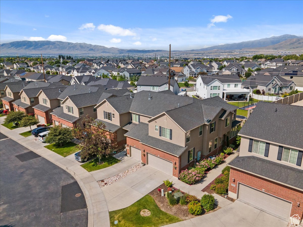 Aerial view of residential area with a mountain backdrop