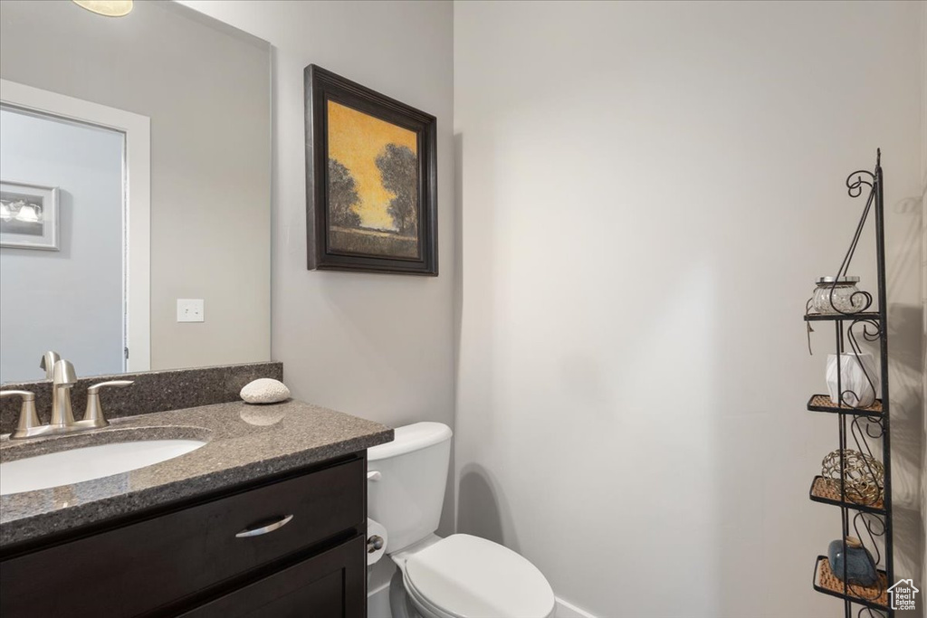Bathroom featuring toilet and vanity