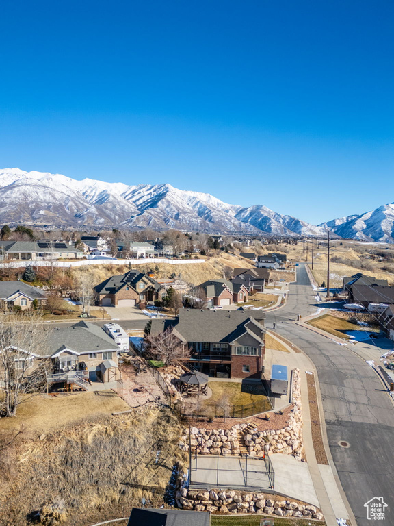 View of mountain background featuring nearby suburban area