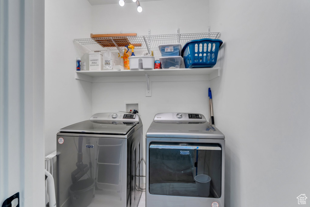 Laundry area featuring washer and clothes dryer