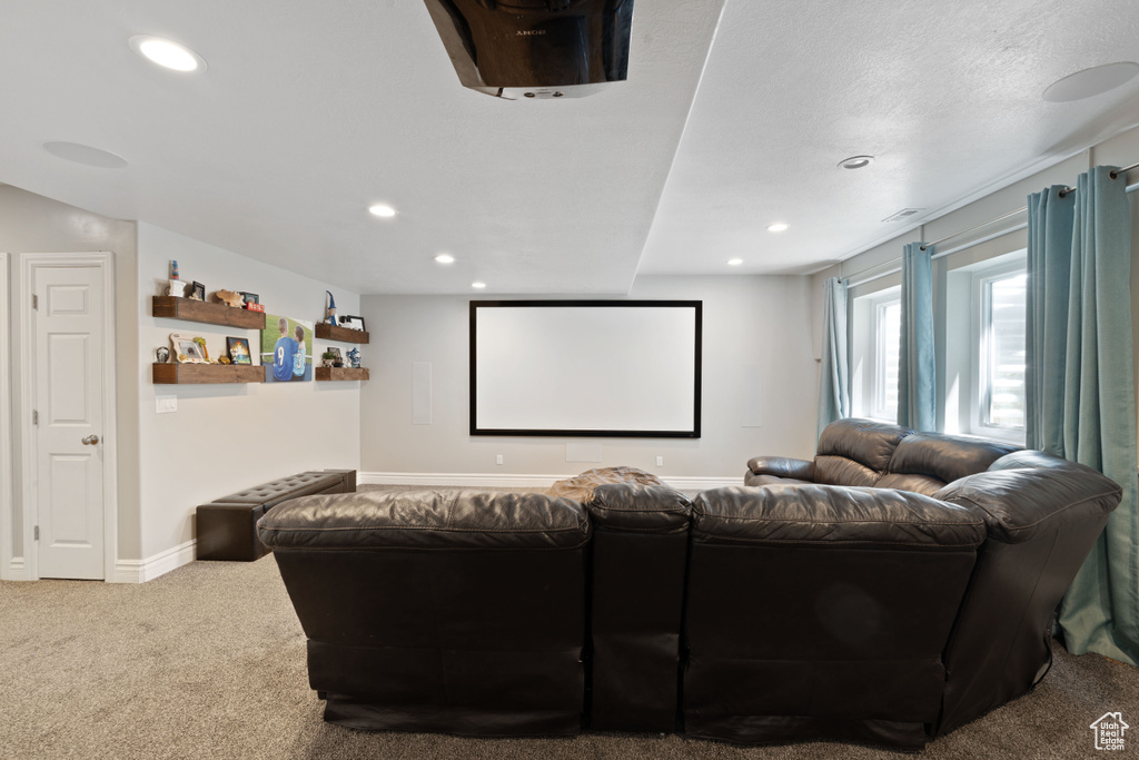 Carpeted cinema featuring recessed lighting and baseboards