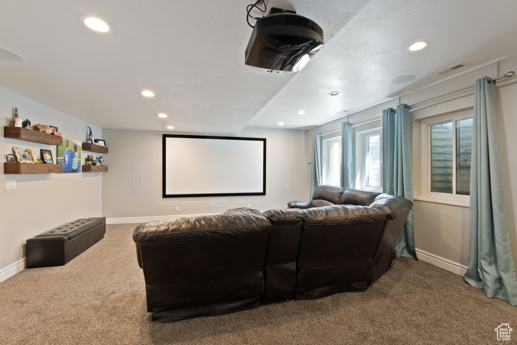 Cinema room with carpet floors, recessed lighting, and baseboards