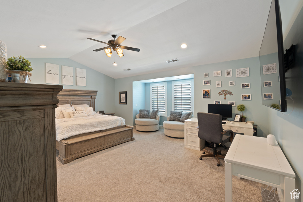 Bedroom featuring light colored carpet, a desk, vaulted ceiling, a ceiling fan, and recessed lighting