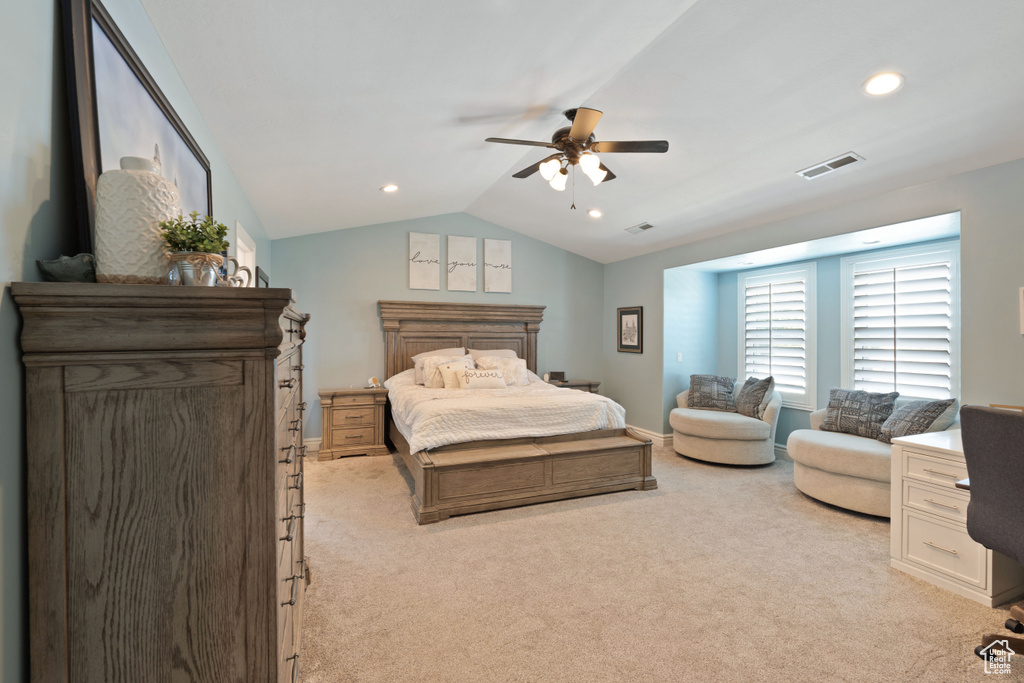 Bedroom featuring lofted ceiling, light colored carpet, recessed lighting, and a ceiling fan