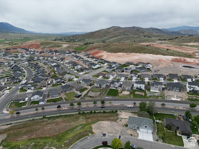 Aerial view of property\\\'s location with mountains and nearby suburban area