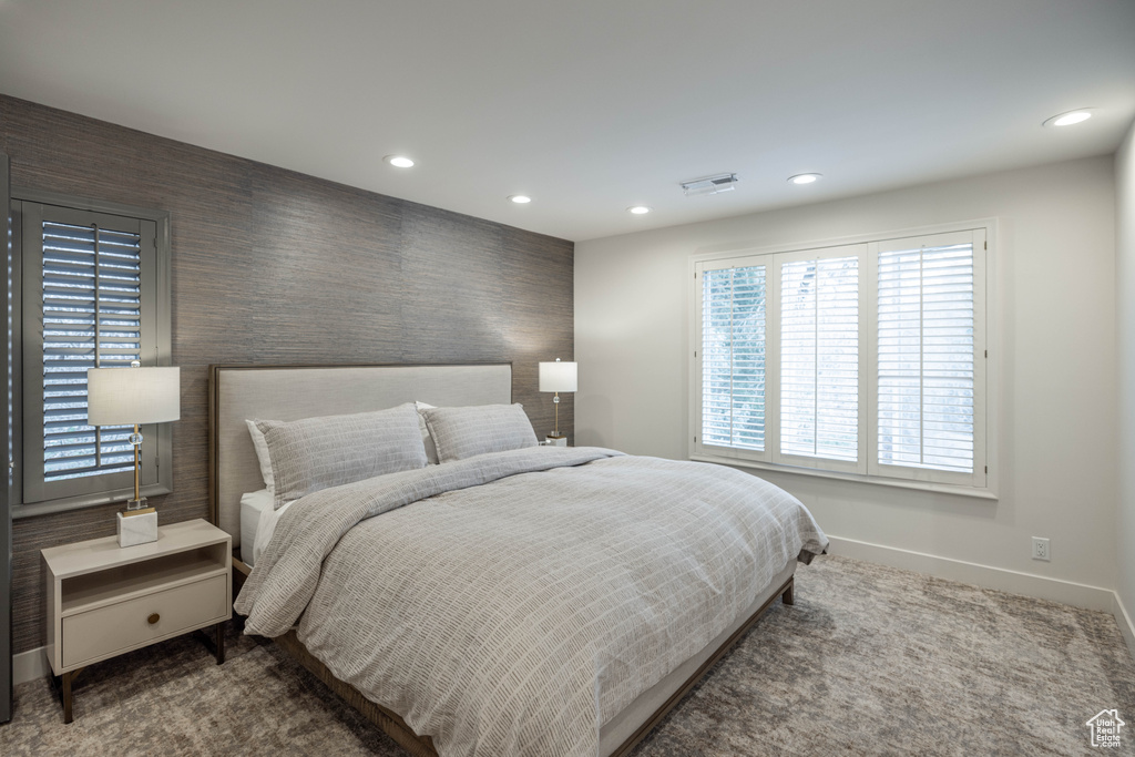 Bedroom featuring carpet floors