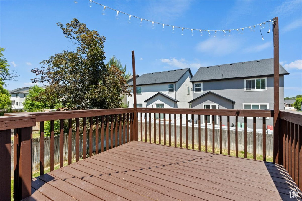 Wooden deck featuring a residential view