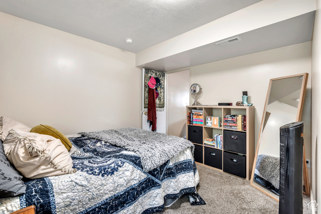 Bedroom with carpet flooring