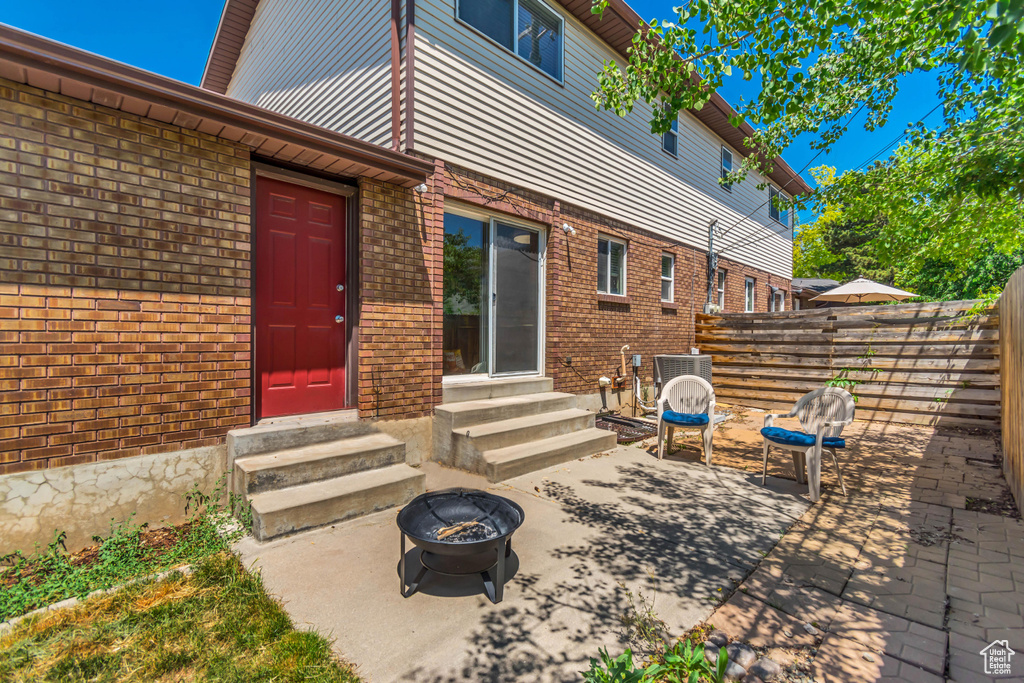 View of patio / terrace featuring entry steps and an outdoor fire pit