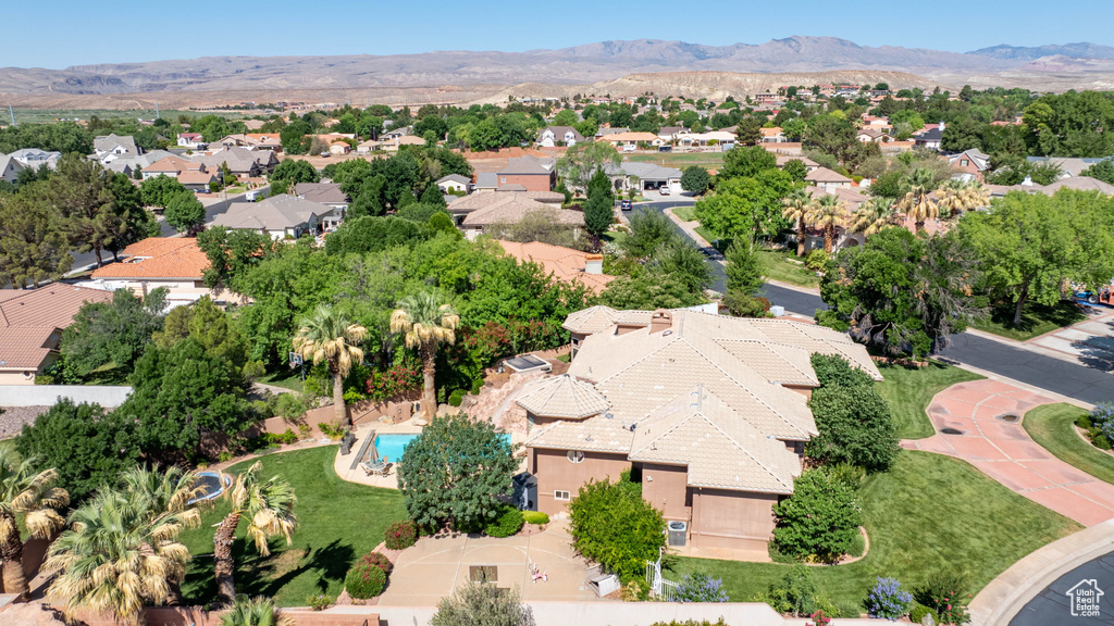Aerial view of residential area with a mountain backdrop