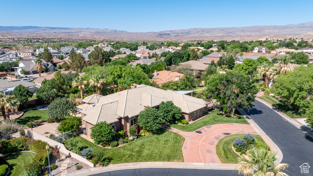 Aerial view of residential area featuring mountains