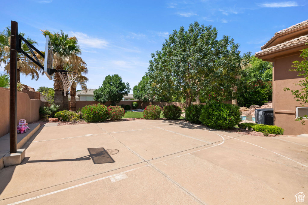 View of patio featuring basketball court