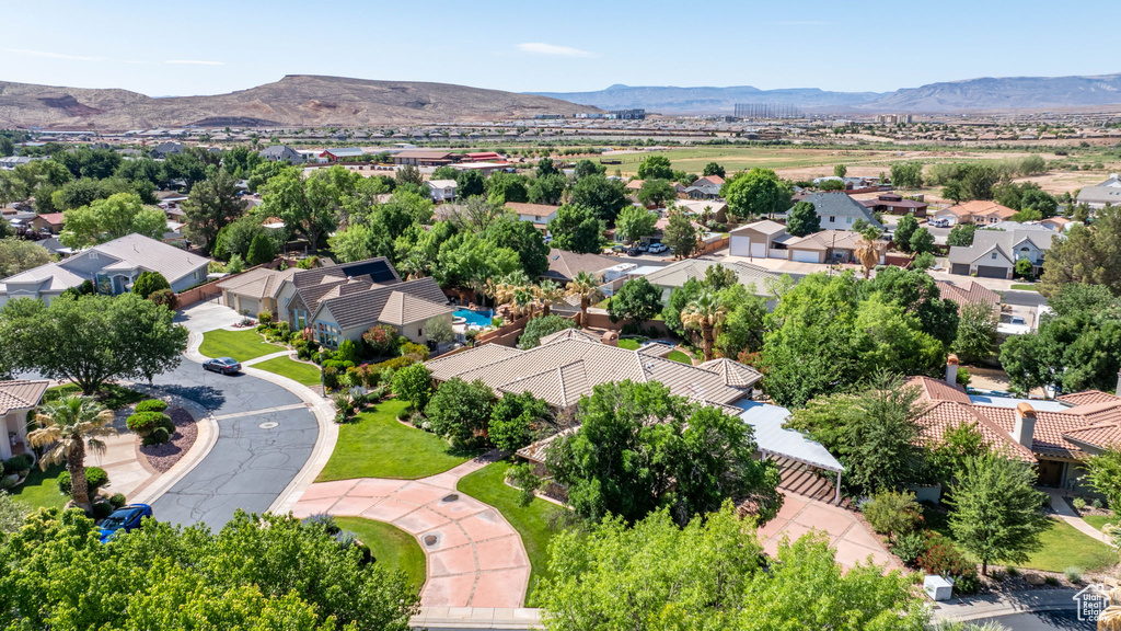 Aerial view of residential area with a mountain backdrop