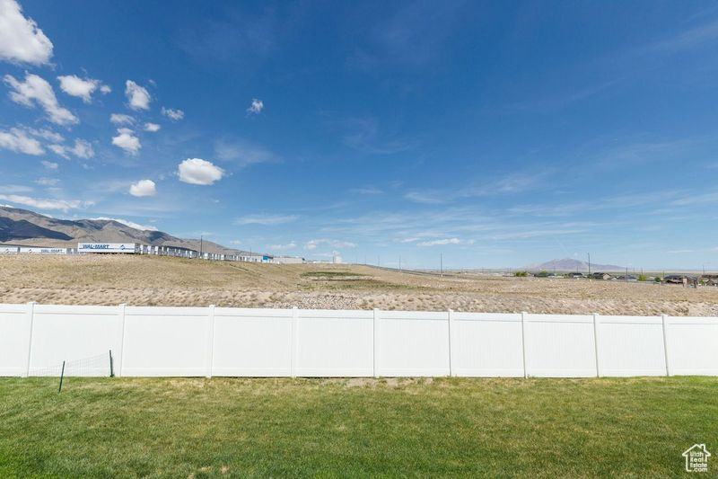View of yard with a mountain view