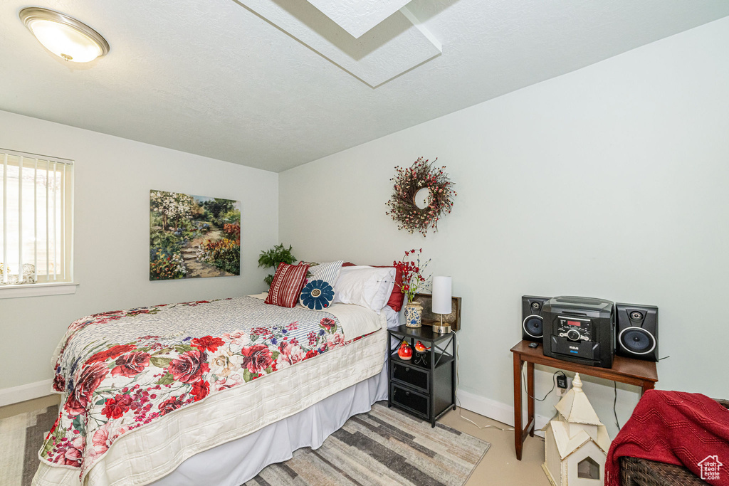 Bedroom with baseboards