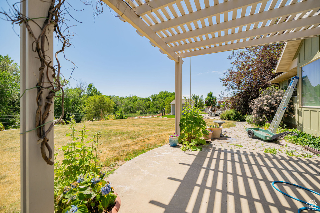 View of patio with a pergola