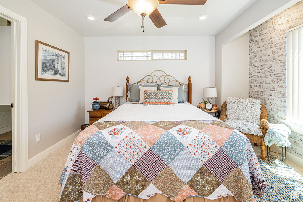 Carpeted bedroom featuring a ceiling fan, recessed lighting, and baseboards