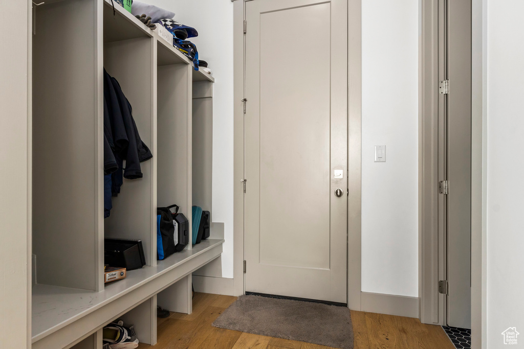 Mudroom with light wood-style floors