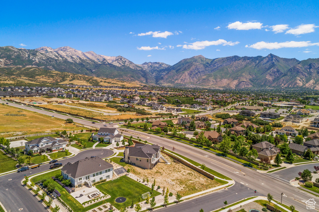 Aerial view of residential area with a mountain backdrop