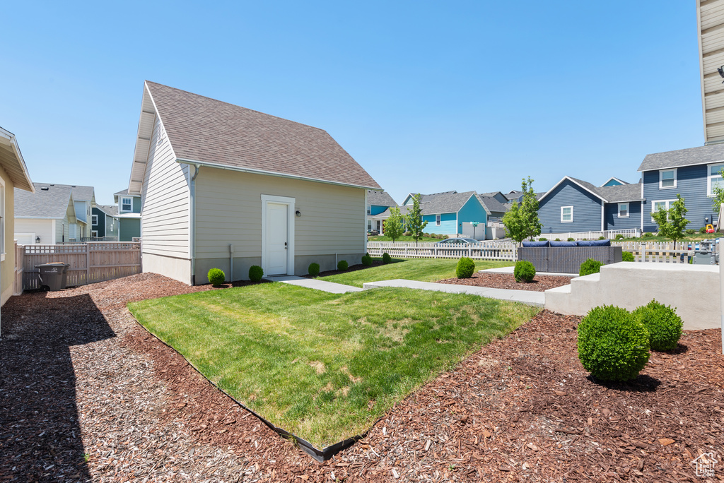View of yard with a residential view
