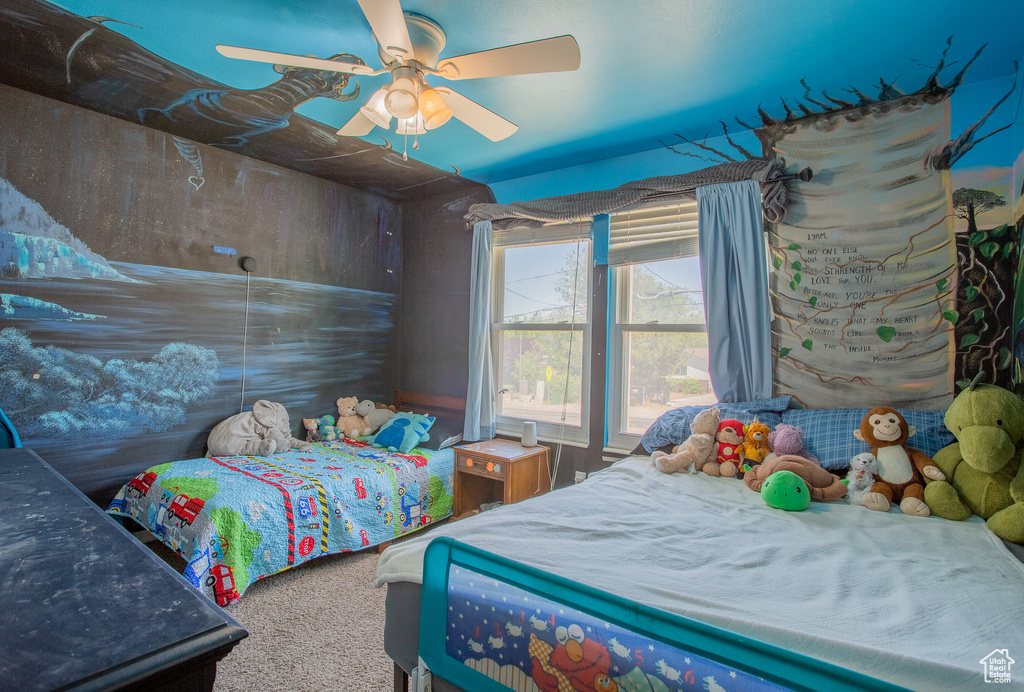 Bedroom with carpet floors and ceiling fan