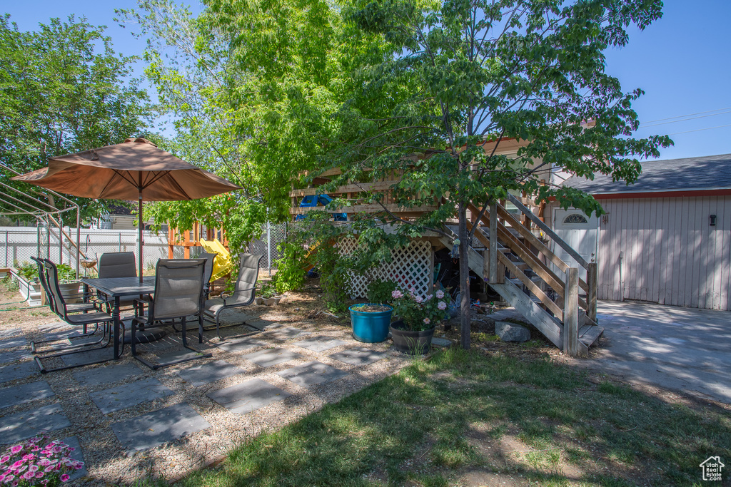 View of patio / terrace with stairs and outdoor dining area