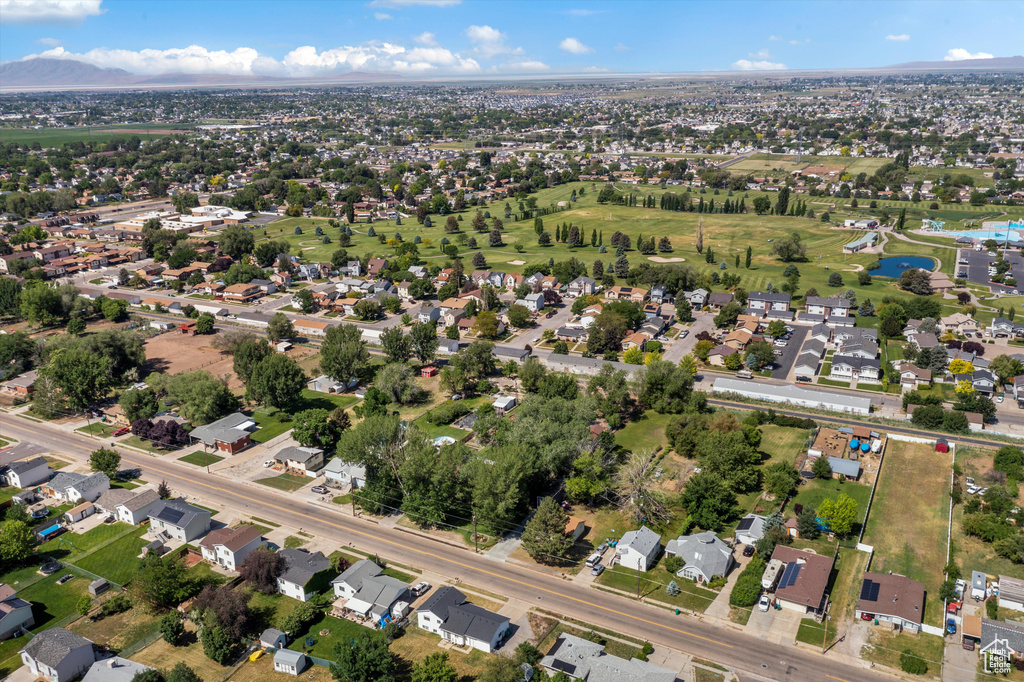 View of property location with a large body of water and nearby suburban area