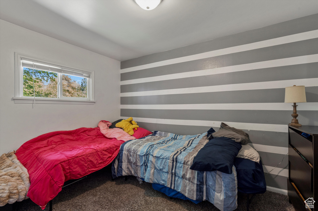 Bedroom featuring carpet floors