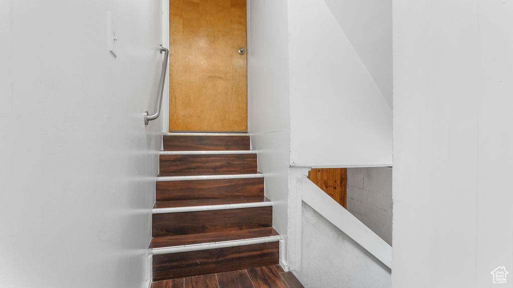 Staircase with wood finished floors