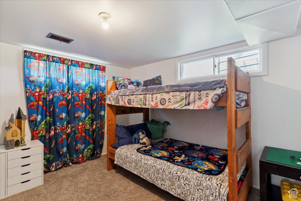 Bedroom featuring carpet