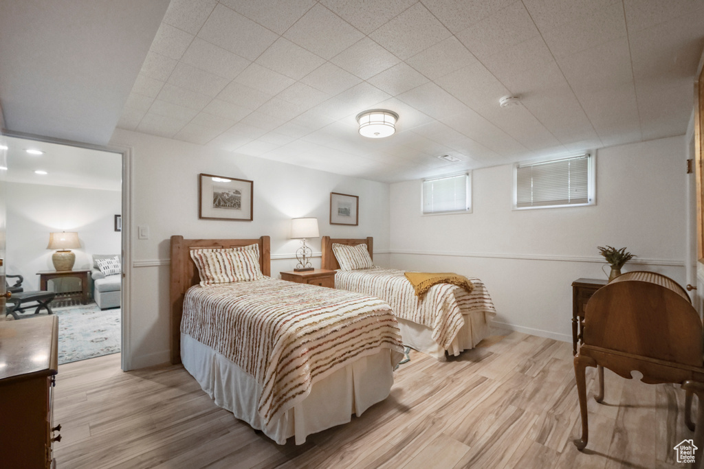 Bedroom with wood finished floors