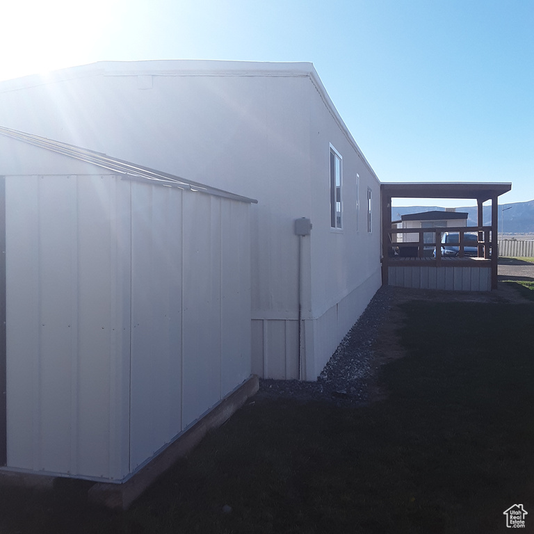 View of home's exterior featuring a deck